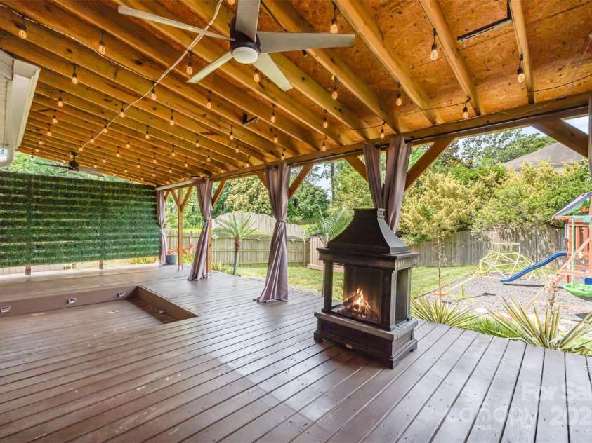 11109 Amur Court, Charlotte, NC 28262.  MLS# CAR4254814, YatesRealty ID 21128. Back Covered Porch