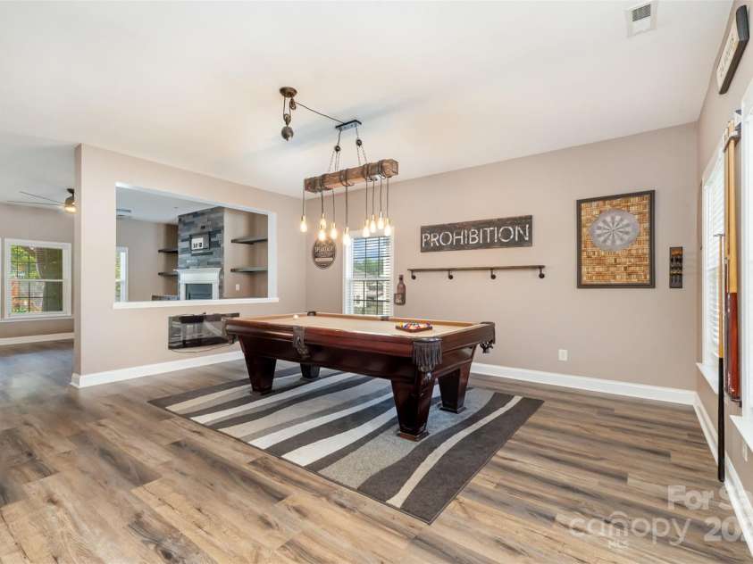 11109 Amur Court, Charlotte, NC 28262.  MLS# CAR4254814, YatesRealty ID 21128. Living Room, Billiard Room or Dining Room