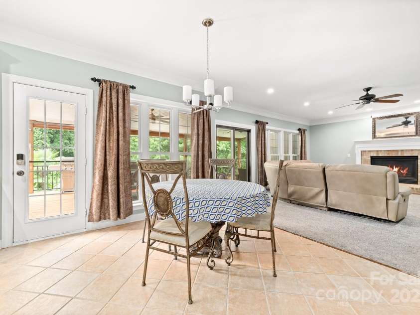 12002 Cobham Court, Huntersville, NC 28078.  MLS# CAR4269076, YatesRealty ID 21134. Dining area looking in to the den