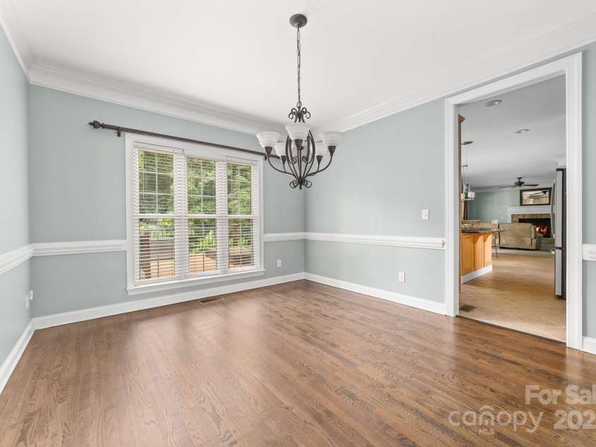 12002 Cobham Court, Huntersville, NC 28078.  MLS# CAR4269076, YatesRealty ID 21134. Dining room leading into the kitchen