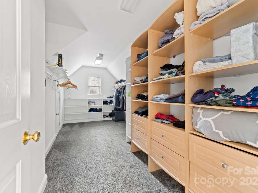 12002 Cobham Court, Huntersville, NC 28078.  MLS# CAR4269076, YatesRealty ID 21134. Large primary closet with built ins