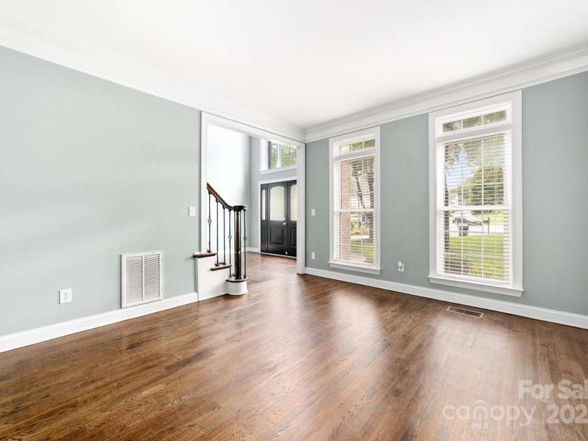 12002 Cobham Court, Huntersville, NC 28078.  MLS# CAR4269076, YatesRealty ID 21134. Living Room toward the front of the home