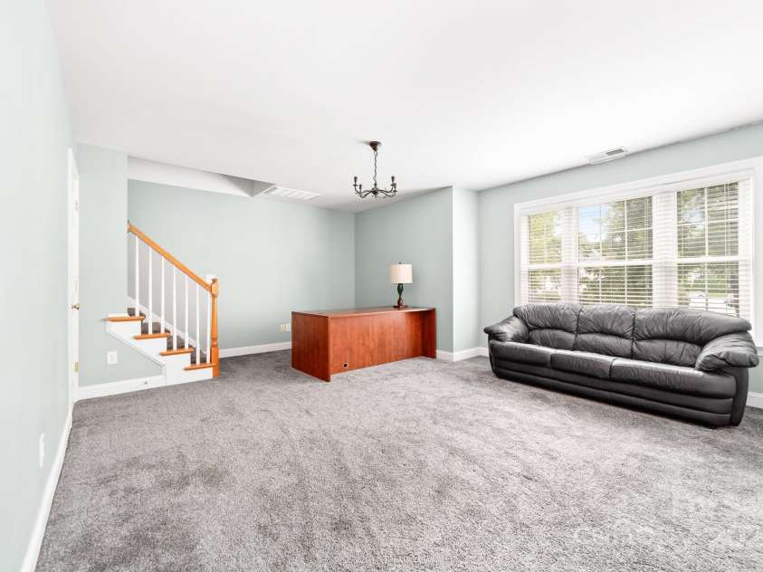 12002 Cobham Court, Huntersville, NC 28078.  MLS# CAR4269076, YatesRealty ID 21134. Loft area leads to 3rd floor unfinished attic