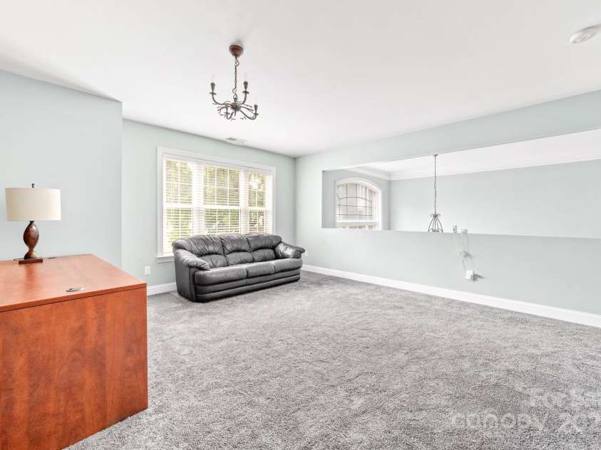 12002 Cobham Court, Huntersville, NC 28078.  MLS# CAR4269076, YatesRealty ID 21134. Loft area on upper floor