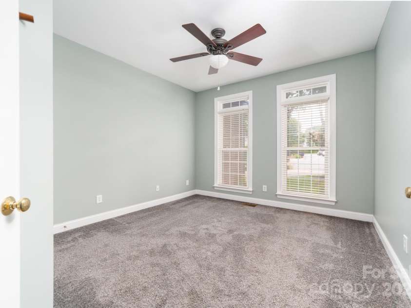 12002 Cobham Court, Huntersville, NC 28078.  MLS# CAR4269076, YatesRealty ID 21134. Main floor bedroom/office with french doors