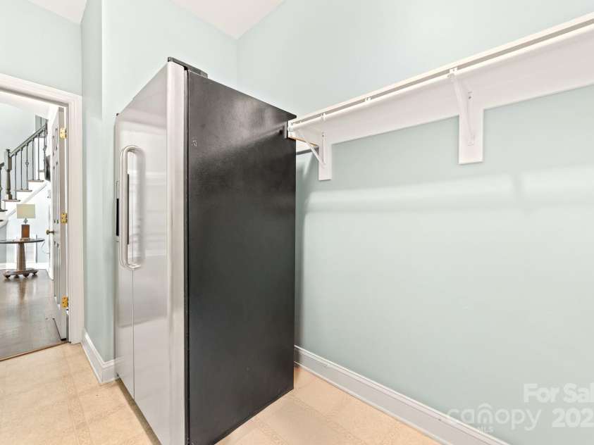 12002 Cobham Court, Huntersville, NC 28078.  MLS# CAR4269076, YatesRealty ID 21134. Main floor mud roon with refrigerator that remains. W/D hook ups here too.