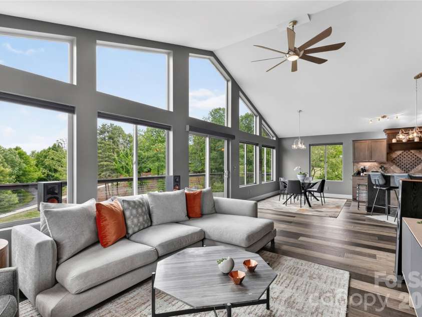 141 Round Top Circle, Mills River, NC 28759.  MLS# CAR4379751, YatesRealty ID 21136. Impeccably maintained floors complement the open-concept layout.