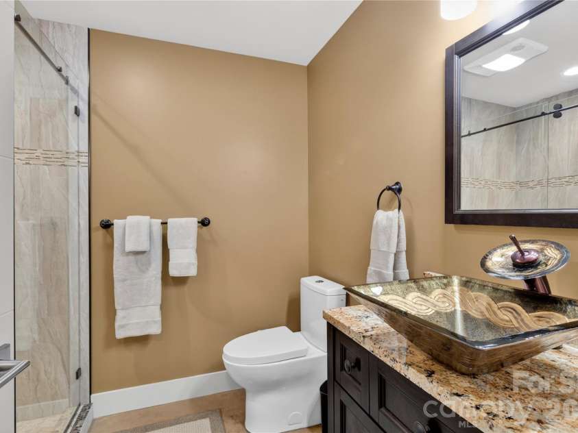 141 Round Top Circle, Mills River, NC 28759.  MLS# CAR4379751, YatesRealty ID 21136. Lower level bathroom