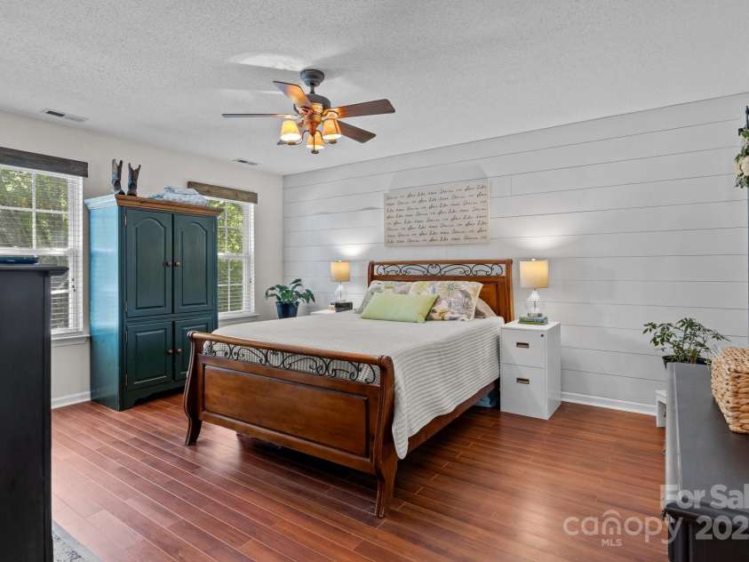 8700 Fox Tail Lane, Huntersville, NC 28078.  MLS# CAR4269110, YatesRealty ID 21136. Spacious primary suite is a serene retreat, featuring warm and low maintenance flooring.