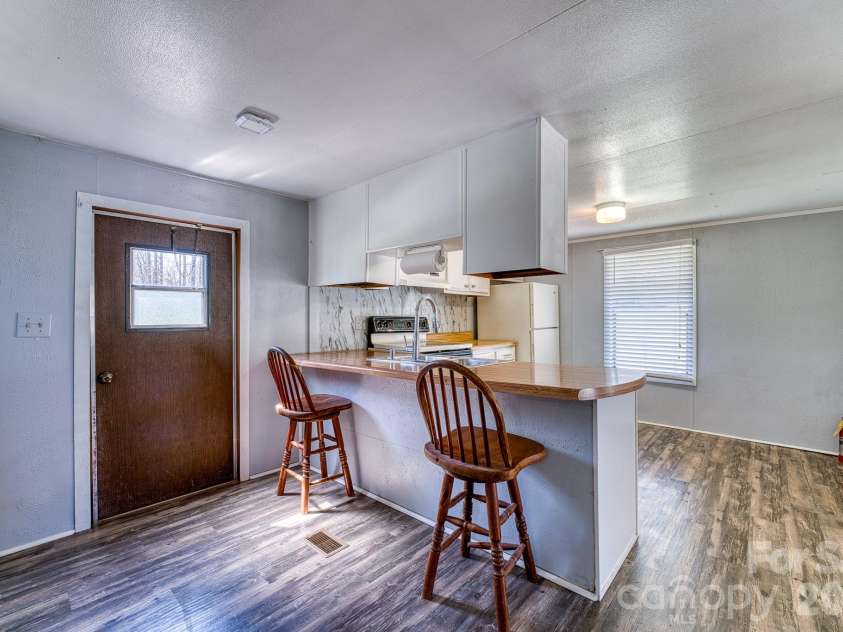 2456 Hendersonville Highway, Pisgah Forest, NC 28768.  MLS# CAR4363378, YatesRealty ID 21138. 