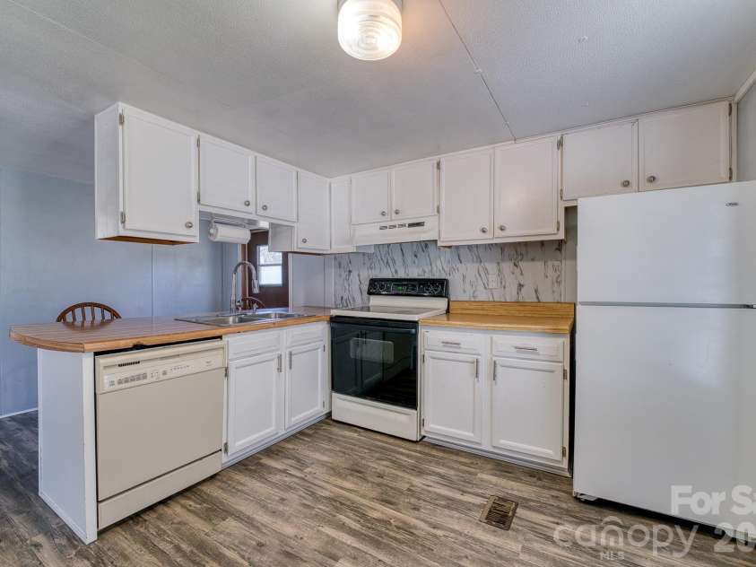 2456 Hendersonville Highway, Pisgah Forest, NC 28768.  MLS# CAR4363378, YatesRealty ID 21138. 