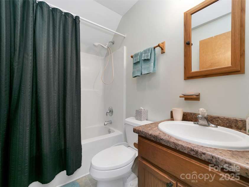 144 Panther Gap Road, Brevard, NC 28712.  MLS# CAR4240689, YatesRealty ID 21141. Full bath upstairs