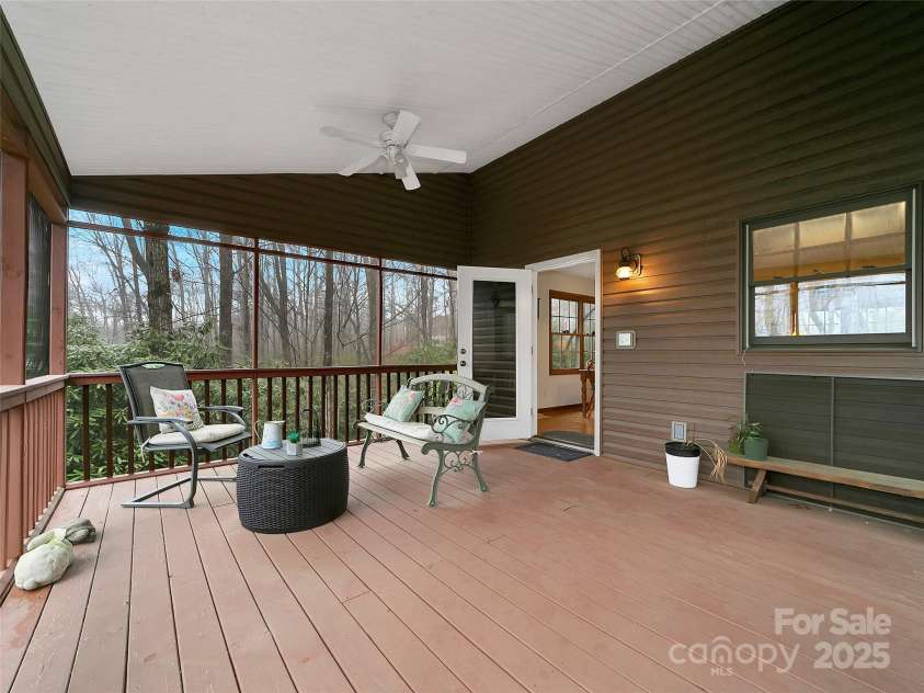 144 Panther Gap Road, Brevard, NC 28712.  MLS# CAR4240689, YatesRealty ID 21141. Large screen porch