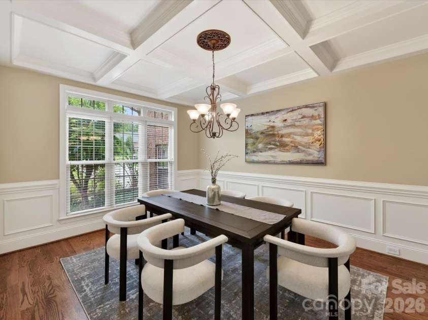 2007 Sugar Mill Road, Indian Trail, NC 28079.  MLS# CAR4375322, YatesRealty ID 21143. Dining room with coffered ceiling and wainscoting