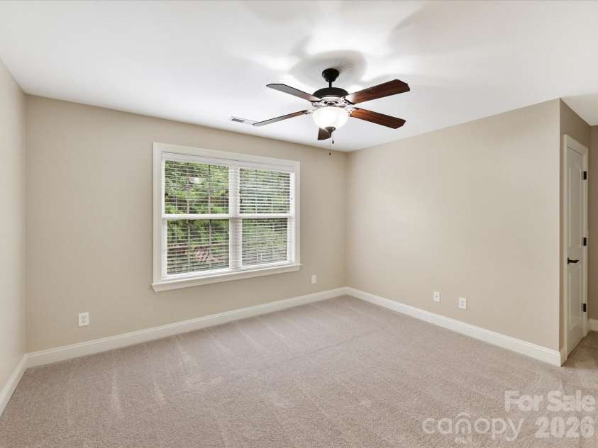 2007 Sugar Mill Road, Indian Trail, NC 28079.  MLS# CAR4375322, YatesRealty ID 21143. Guest room with full bath that shares with hall access