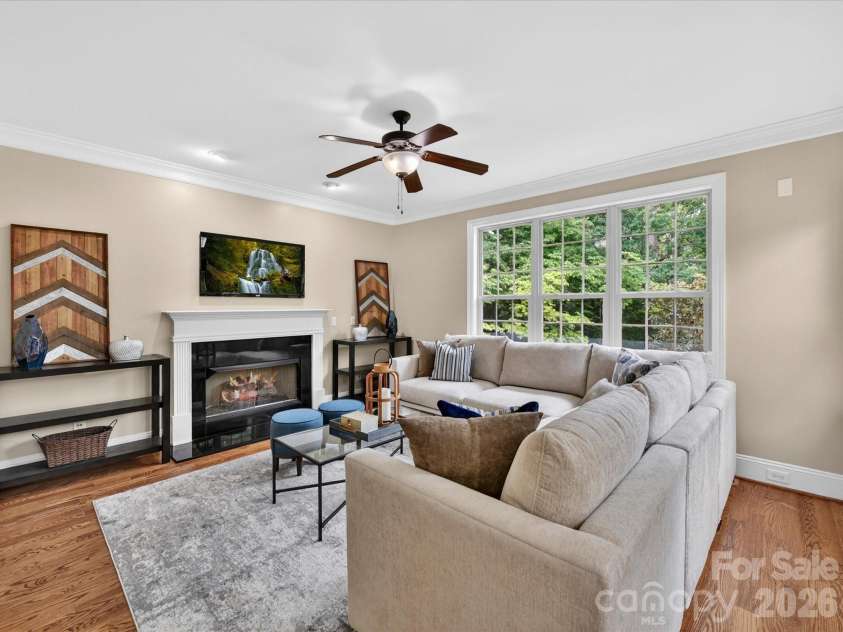 2007 Sugar Mill Road, Indian Trail, NC 28079.  MLS# CAR4375322, YatesRealty ID 21143. Keeping room/Den with fireplace off of kitchen and breakfast nook