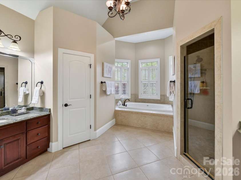 2007 Sugar Mill Road, Indian Trail, NC 28079.  MLS# CAR4375322, YatesRealty ID 21143. Separate shower with glass door 