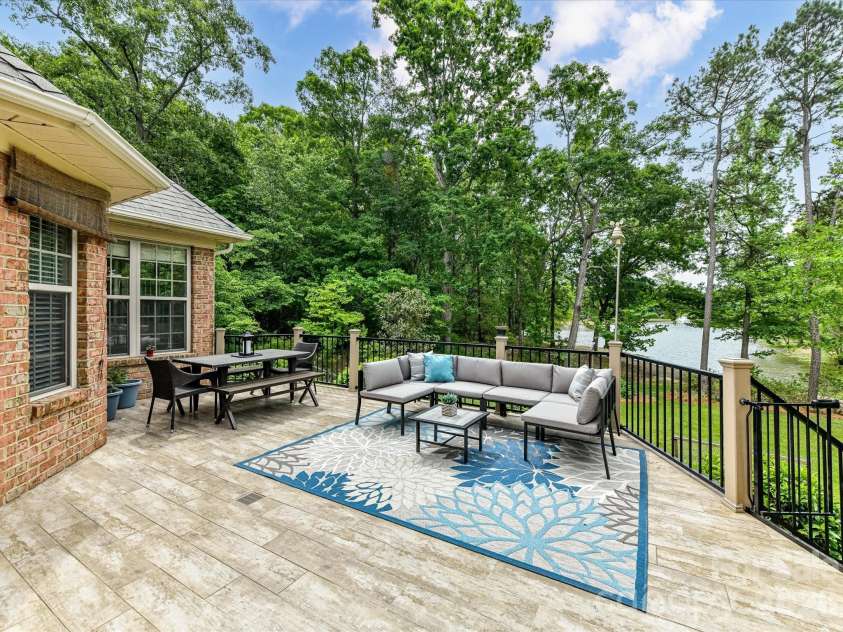 2007 Sugar Mill Road, Indian Trail, NC 28079.  MLS# CAR4375322, YatesRealty ID 21143. Spacious tiled deck with water view