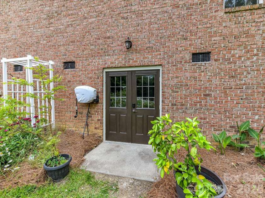 2007 Sugar Mill Road, Indian Trail, NC 28079.  MLS# CAR4375322, YatesRealty ID 21143. Walk-in storage in crawspace