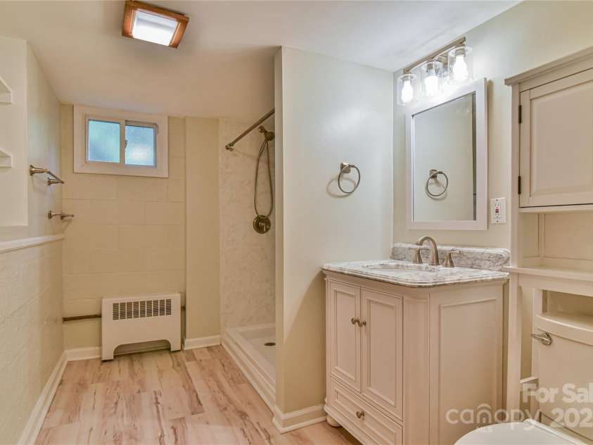 5 Old Cove Road, Black Mountain, NC 28711.  MLS# CAR4263653, YatesRealty ID 21143. Downstairs Bathroom