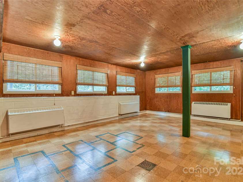 5 Old Cove Road, Black Mountain, NC 28711.  MLS# CAR4263653, YatesRealty ID 21143. Downstairs Playroom