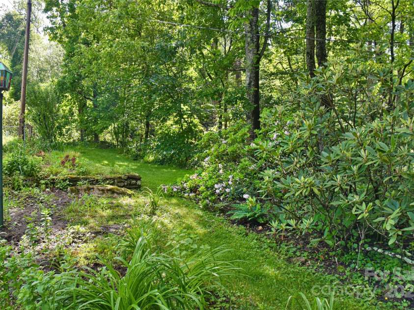 5 Old Cove Road, Black Mountain, NC 28711.  MLS# CAR4263653, YatesRealty ID 21143. Front Yard Raised Bed