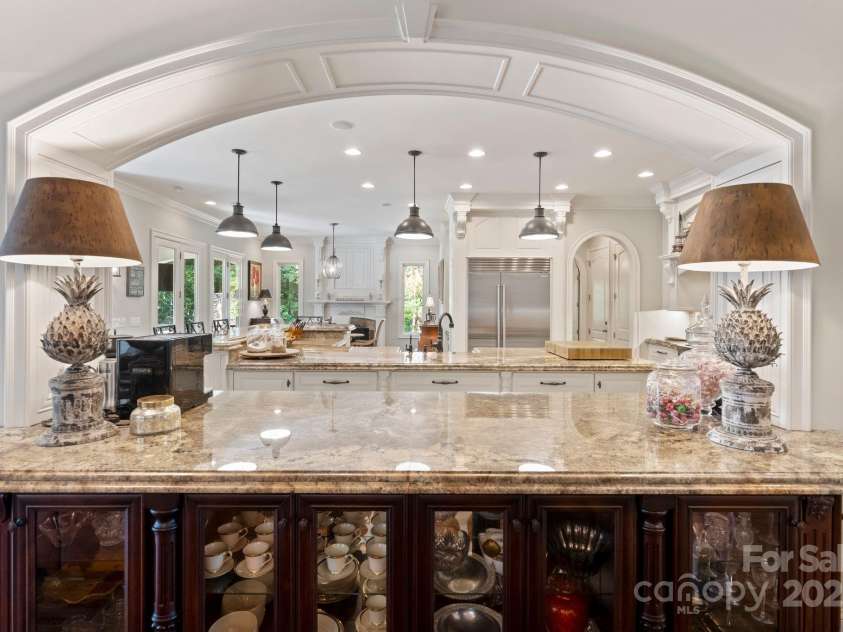 167 Quaker Road, Mooresville, NC 28117.  MLS# CAR4261192, YatesRealty ID 21144. 2nd Island with built in China cabinet.