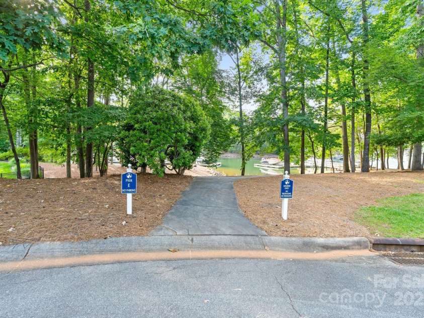 167 Quaker Road, Mooresville, NC 28117.  MLS# CAR4261192, YatesRealty ID 21144. Cart path to deeded boat slip - Pier E #10