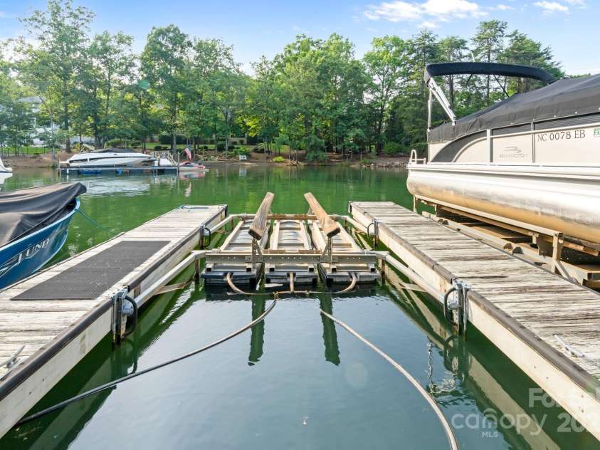 167 Quaker Road, Mooresville, NC 28117.  MLS# CAR4261192, YatesRealty ID 21144. Deeded boat slip with newer boat lift.