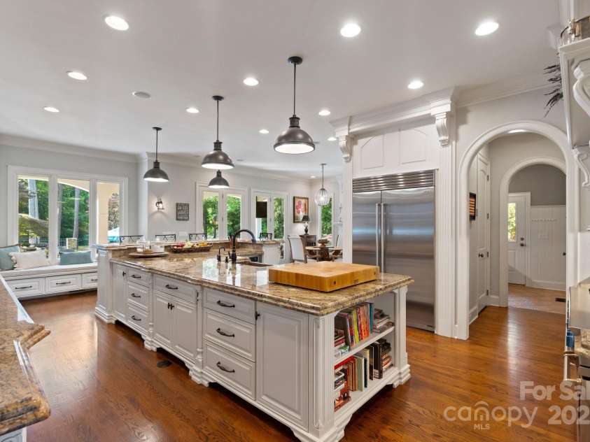 167 Quaker Road, Mooresville, NC 28117.  MLS# CAR4261192, YatesRealty ID 21144. Large kitchen island is the center piece in the stunning kitchen.