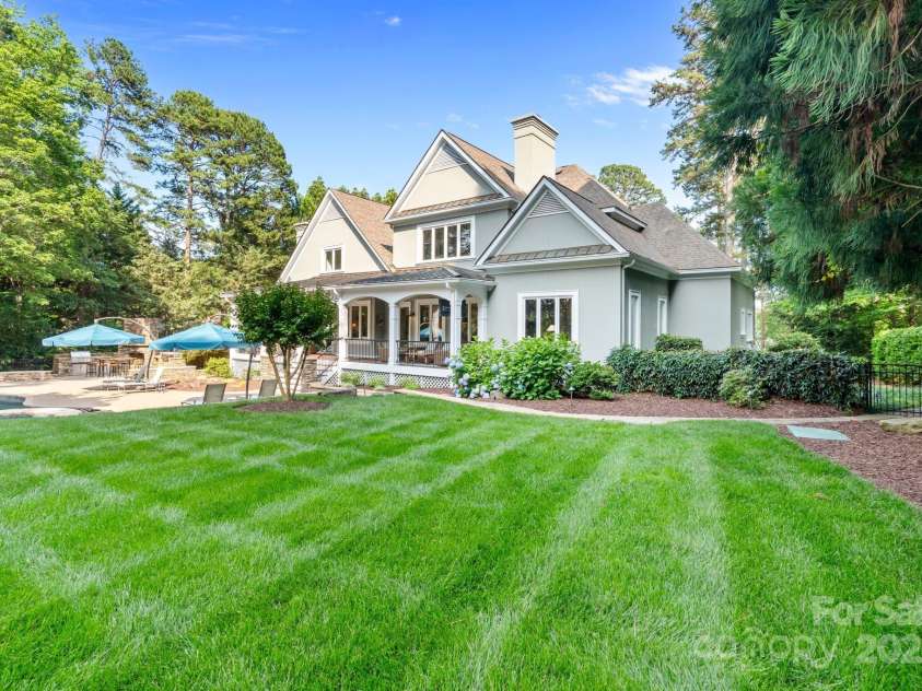 167 Quaker Road, Mooresville, NC 28117.  MLS# CAR4261192, YatesRealty ID 21144. Meticulously land scaped backyard.