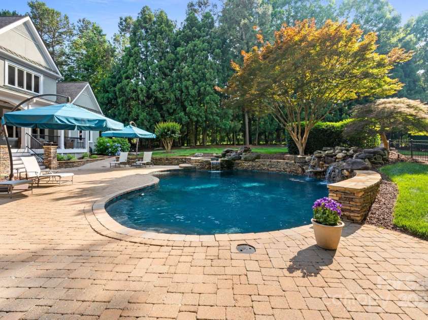 167 Quaker Road, Mooresville, NC 28117.  MLS# CAR4261192, YatesRealty ID 21144. Relax and enjoy a day by the pool.