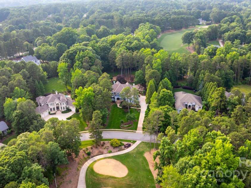 167 Quaker Road, Mooresville, NC 28117.  MLS# CAR4261192, YatesRealty ID 21144. Situated between holes 6 & 7 of Trump National Golf Club