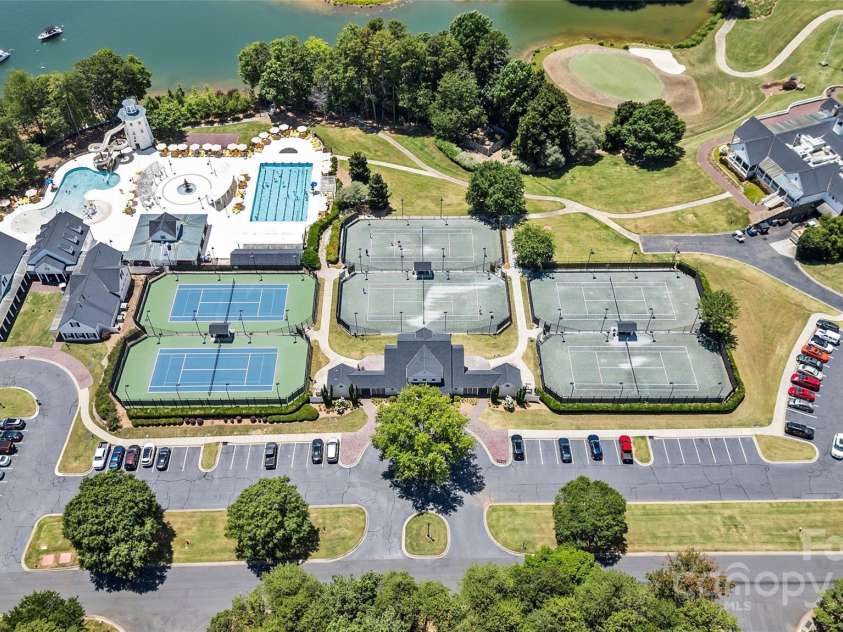 167 Quaker Road, Mooresville, NC 28117.  MLS# CAR4261192, YatesRealty ID 21144. The Point amenities include community pool, fitness, tennis, private golf, restaurant, and so much more!