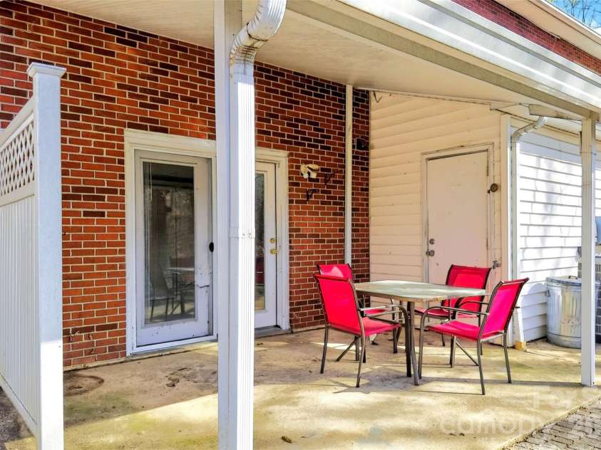 75 Laurelwood Drive, Marion, NC 28752.  MLS# CAR4361973, YatesRealty ID 21144. Private, back patio for morning coffe and good books!