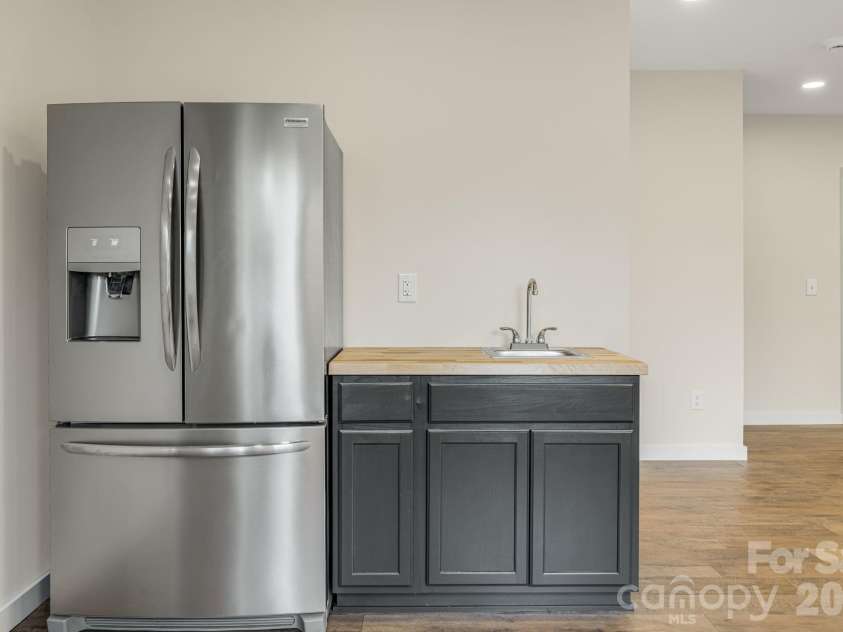 17 Baxter Woods Lane, Candler, NC 28715.  MLS# CAR4370990, YatesRealty ID 21147. Kitchenette on lower level