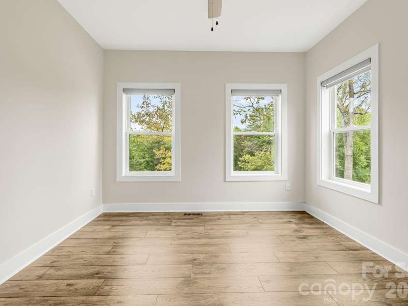17 Baxter Woods Lane, Candler, NC 28715.  MLS# CAR4370990, YatesRealty ID 21147. Main level Bedroom