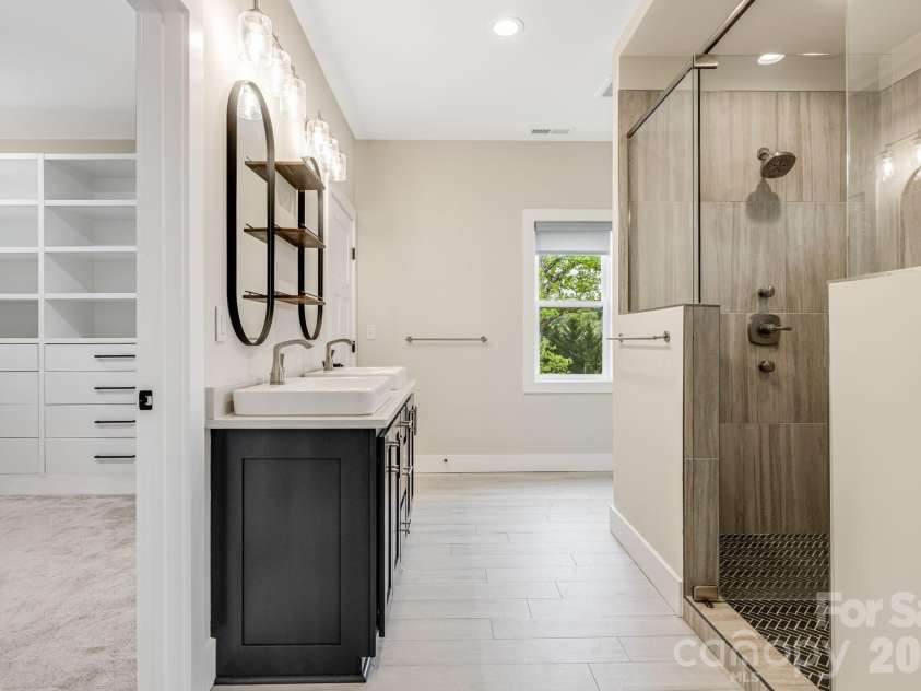 17 Baxter Woods Lane, Candler, NC 28715.  MLS# CAR4370990, YatesRealty ID 21147. Primary Bath