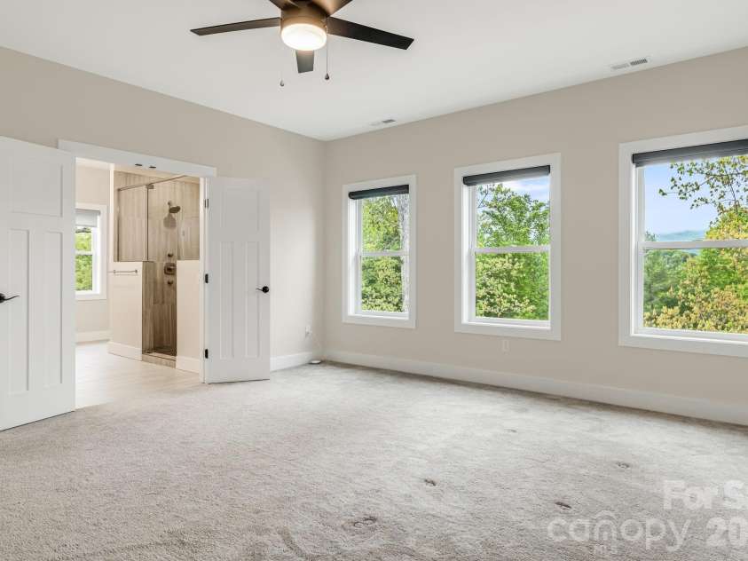 17 Baxter Woods Lane, Candler, NC 28715.  MLS# CAR4370990, YatesRealty ID 21147. Primary Bedroom