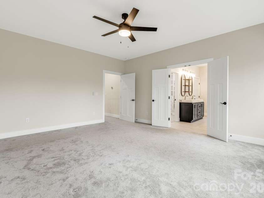 17 Baxter Woods Lane, Candler, NC 28715.  MLS# CAR4370990, YatesRealty ID 21147. Primary Bedroom