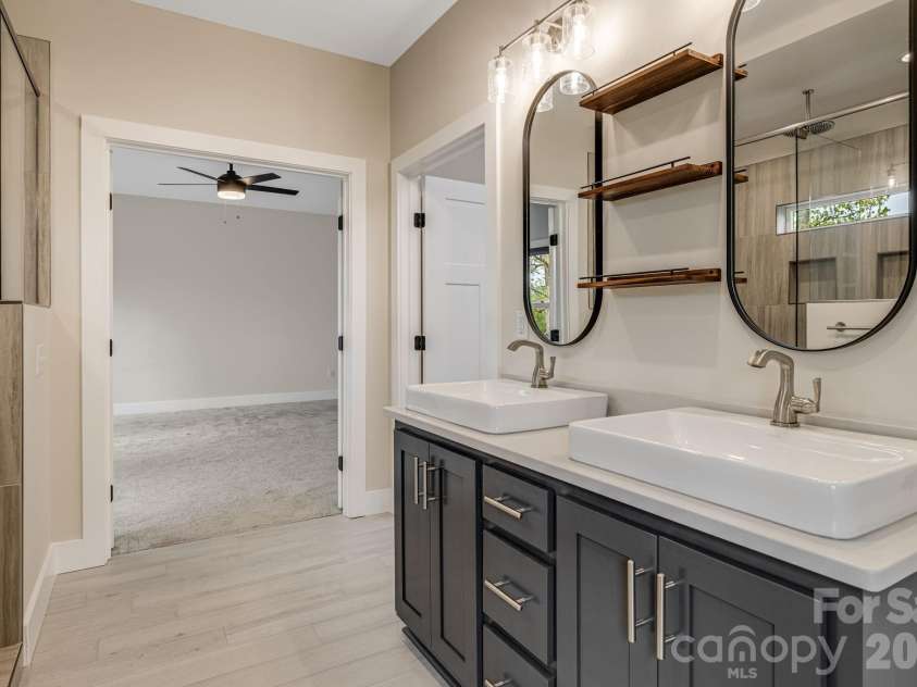 17 Baxter Woods Lane, Candler, NC 28715.  MLS# CAR4370990, YatesRealty ID 21147. Primary vanity