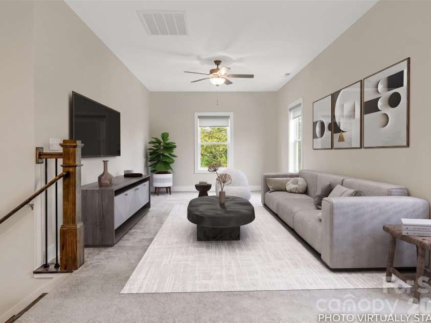 17 Baxter Woods Lane, Candler, NC 28715.  MLS# CAR4370990, YatesRealty ID 21147. Upper level media room