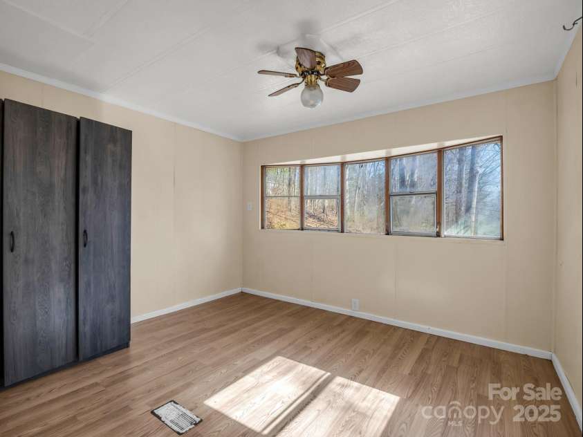 329 Squirrel Hollow Drive, Hendersonville, NC 28791.  MLS# CAR4227560, YatesRealty ID 21149. 2nd Bedroom