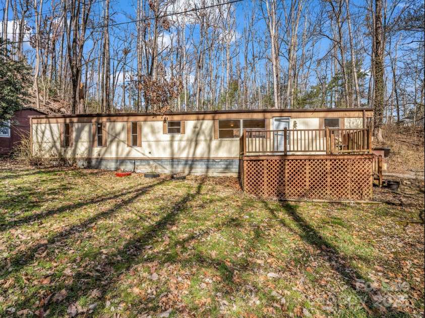 329 Squirrel Hollow Drive, Hendersonville, NC 28791.  MLS# CAR4227560, YatesRealty ID 21149. 