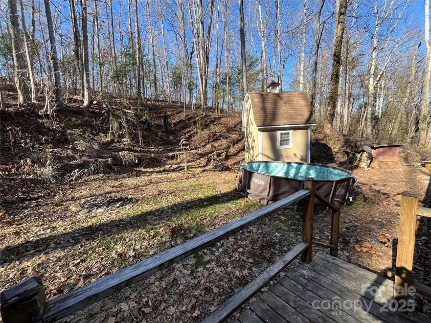 329 Squirrel Hollow Drive, Hendersonville, NC 28791.  MLS# CAR4227560, YatesRealty ID 21149. 