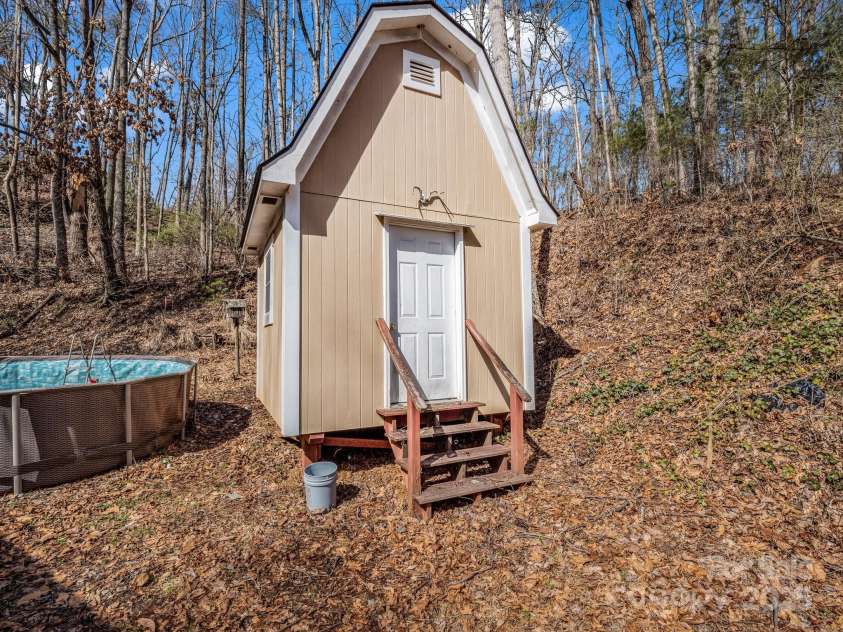 329 Squirrel Hollow Drive, Hendersonville, NC 28791.  MLS# CAR4227560, YatesRealty ID 21149. Storage/Workshop