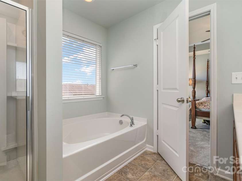 6156 Kilchurn Drive, Fort Mill, SC 29707.  MLS# CAR4268259, YatesRealty ID 21151. Master Bathroom