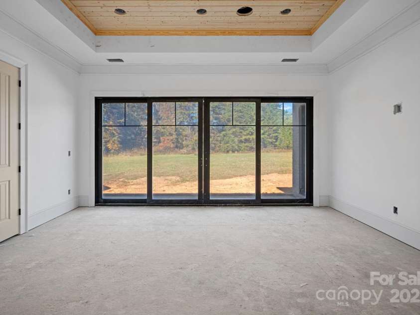 5039 Eliza Long Wilkie Drive, Huntersville, NC 28078.  MLS# CAR4240694, YatesRealty ID 21152. Family/Game room with Anderson sliders to outdoor living
