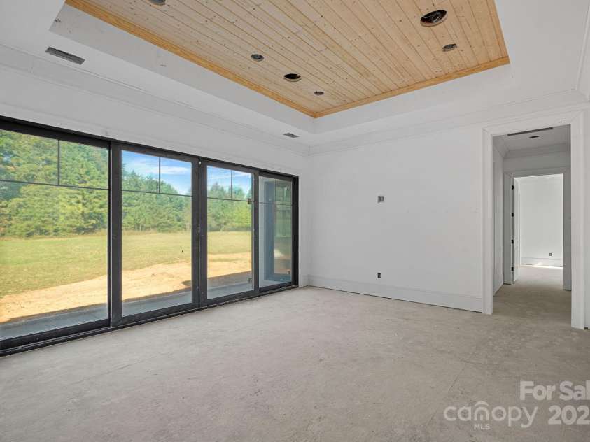 5039 Eliza Long Wilkie Drive, Huntersville, NC 28078.  MLS# CAR4240694, YatesRealty ID 21152. Family/Game room with Anderson sliders to outdoor living