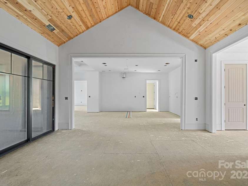 5039 Eliza Long Wilkie Drive, Huntersville, NC 28078.  MLS# CAR4240694, YatesRealty ID 21152. Great room looking towards Kitchen